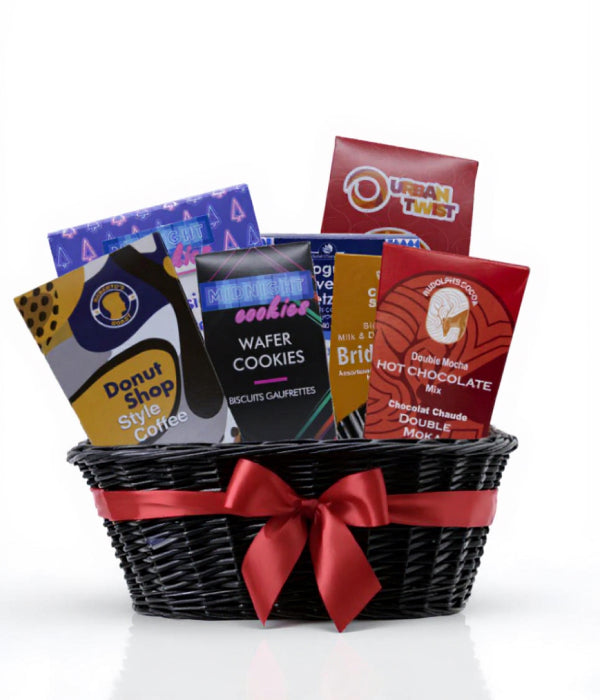 Gourmet gift basket with coffee, hot chocolate, and cookies.