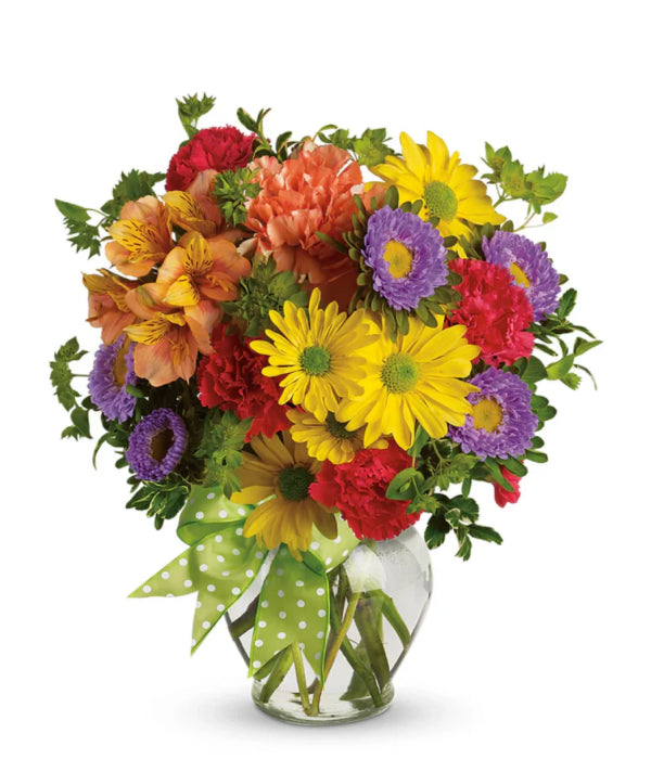 Make-A-Wish bouquet of colorful flowers in a vase