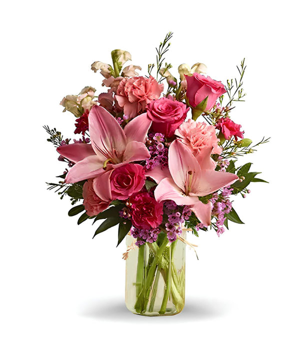 Pink flowers in mason jar